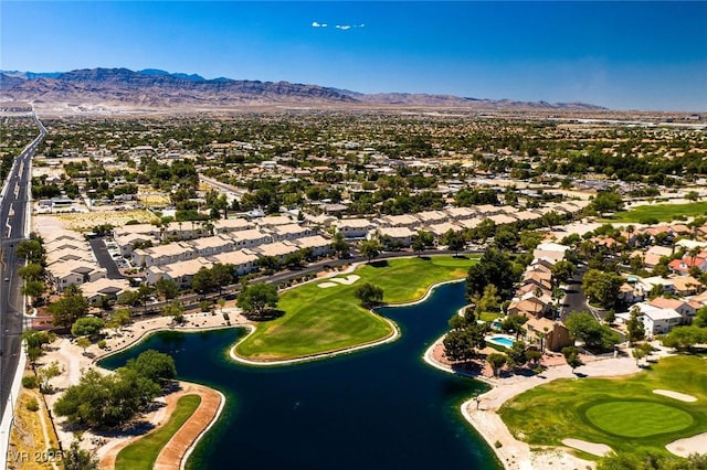 bird's eye view with golf course view, a residential view, and a water and mountain view