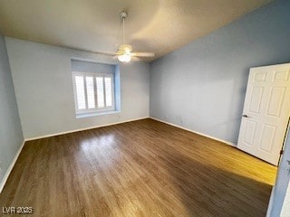 unfurnished room with ceiling fan, baseboards, and wood finished floors