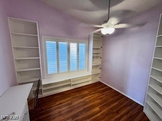 unfurnished bedroom featuring ceiling fan and dark wood-type flooring