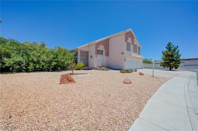 view of side of property featuring a garage