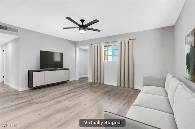 unfurnished living room with ceiling fan and light hardwood / wood-style floors