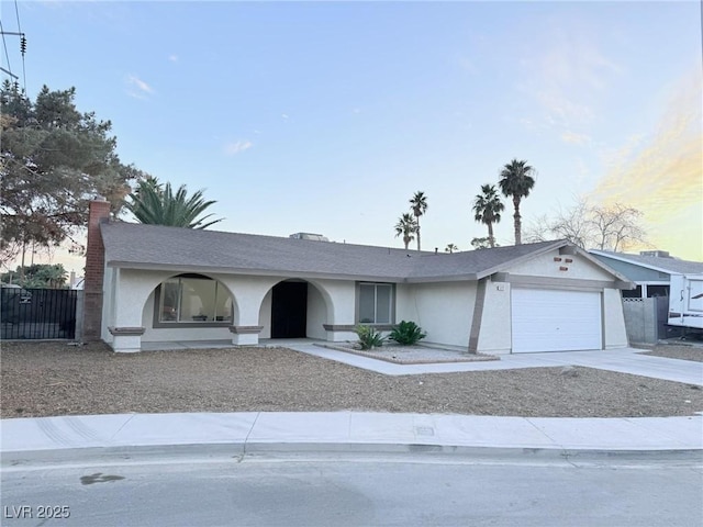 ranch-style home with a garage