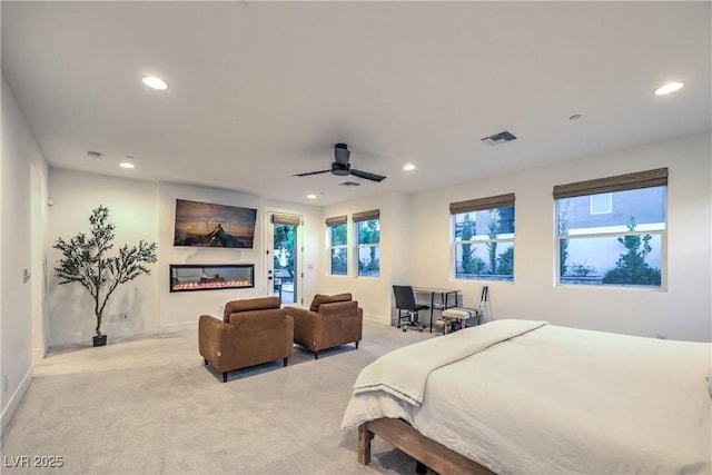 carpeted bedroom featuring ceiling fan