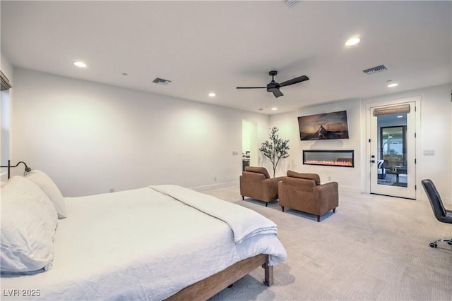 bedroom featuring light carpet, access to outside, and ceiling fan