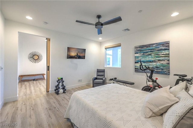 bedroom featuring ceiling fan and light wood-type flooring