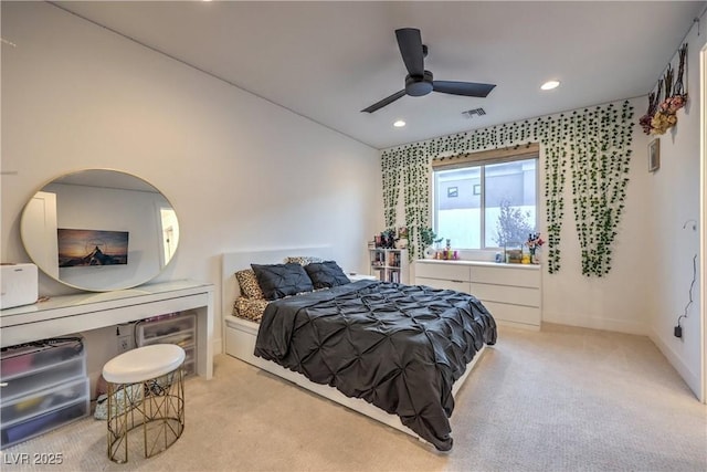 carpeted bedroom featuring ceiling fan