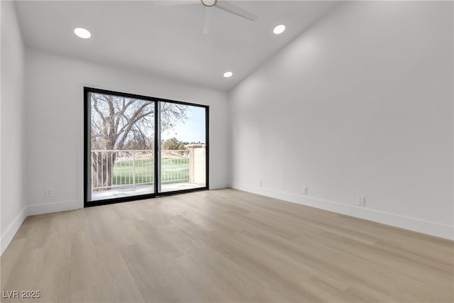 unfurnished room featuring ceiling fan, vaulted ceiling, and light hardwood / wood-style floors