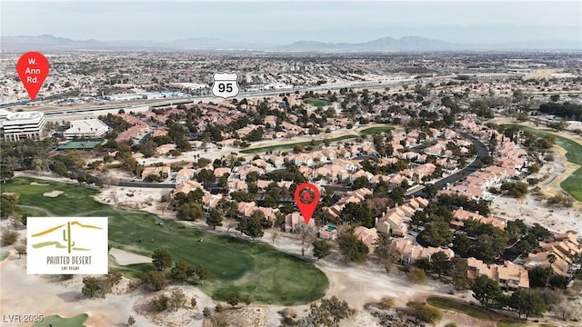 drone / aerial view featuring a mountain view