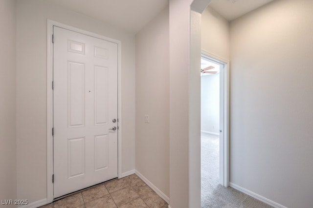 entryway featuring light tile patterned floors