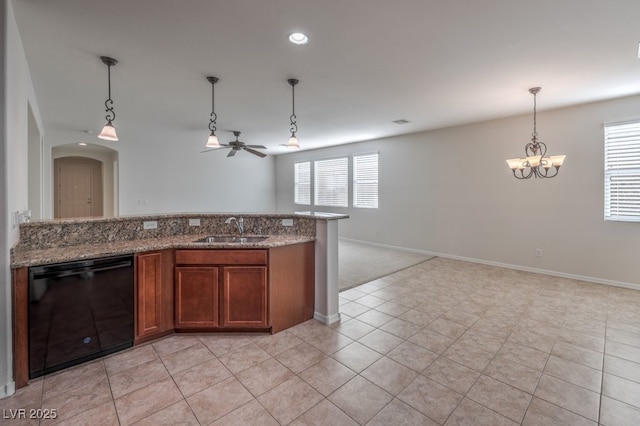 kitchen featuring dishwasher, pendant lighting, sink, and a wealth of natural light