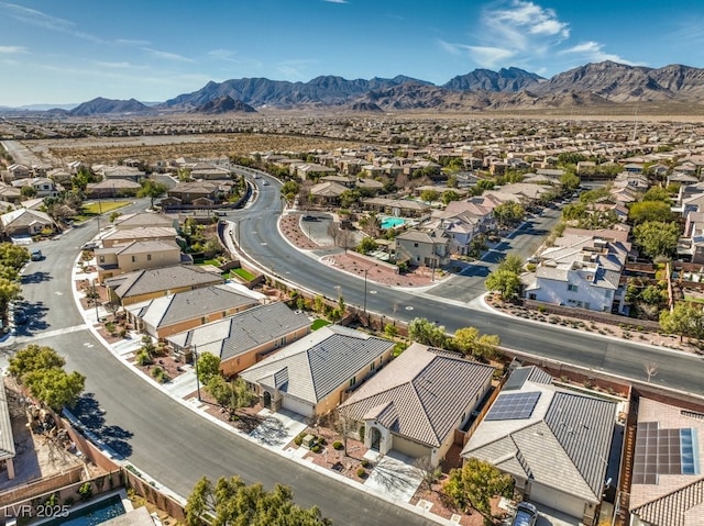 drone / aerial view featuring a mountain view