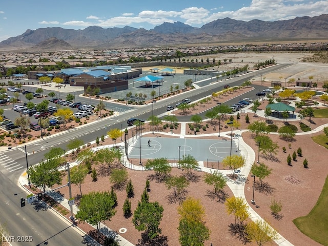 birds eye view of property featuring a mountain view