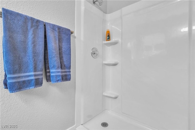 bathroom with walk in shower