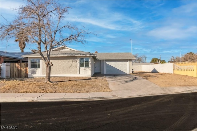 single story home featuring a garage