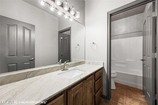 full bathroom featuring tile patterned flooring, vanity, tub / shower combination, and toilet