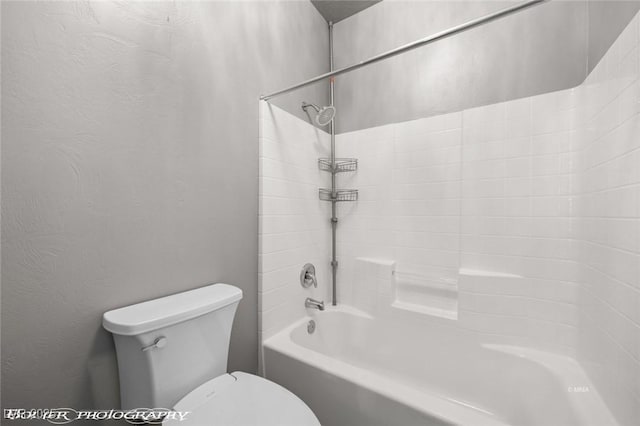 bathroom with  shower combination and toilet