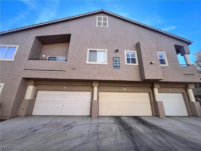 exterior space with a garage