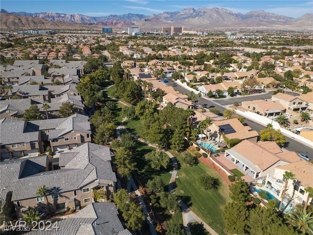 bird's eye view with a residential view and a mountain view