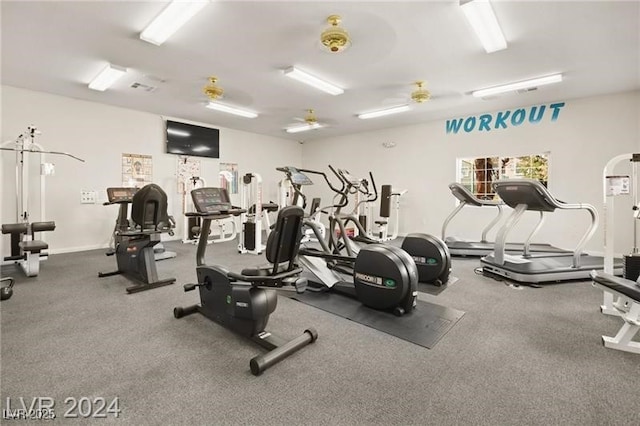 workout area with ceiling fan