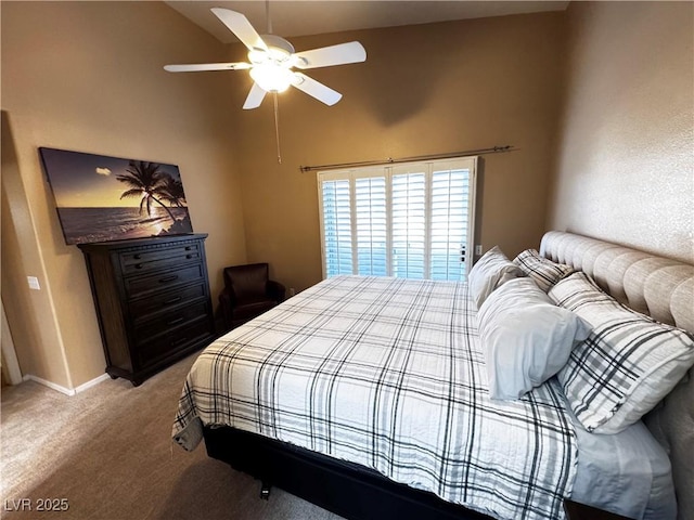 carpeted bedroom with high vaulted ceiling, ceiling fan, and baseboards