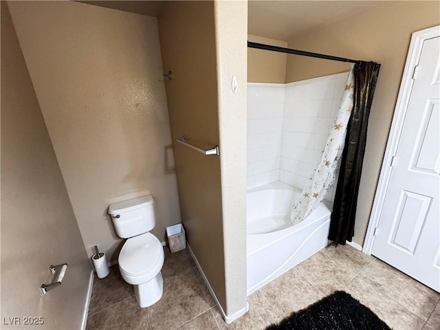 full bath with baseboards, shower / tub combo, toilet, and tile patterned floors