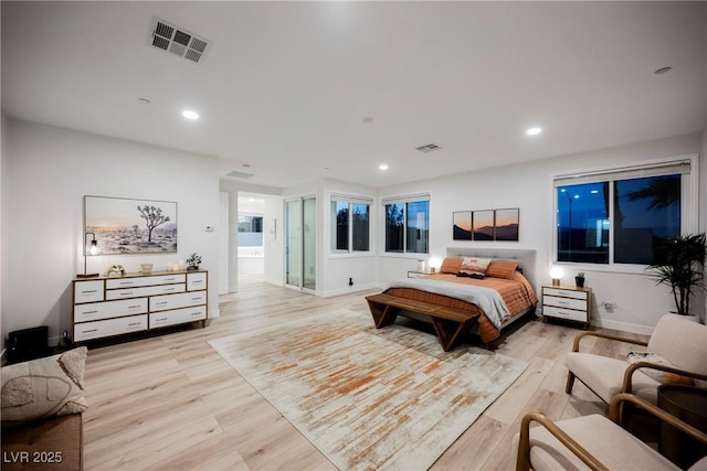 bedroom with light wood-type flooring