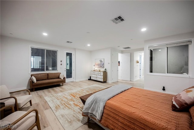 bedroom with light wood-type flooring