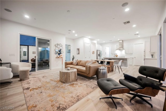 living room featuring light wood-type flooring