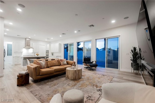 living room featuring light hardwood / wood-style floors