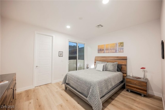 bedroom featuring access to outside and light wood-type flooring