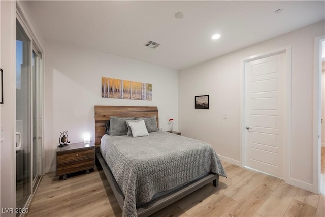 bedroom featuring light wood-type flooring