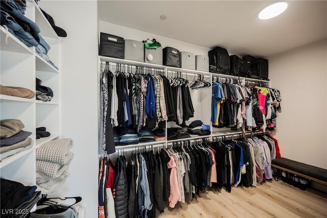 spacious closet featuring light wood-type flooring