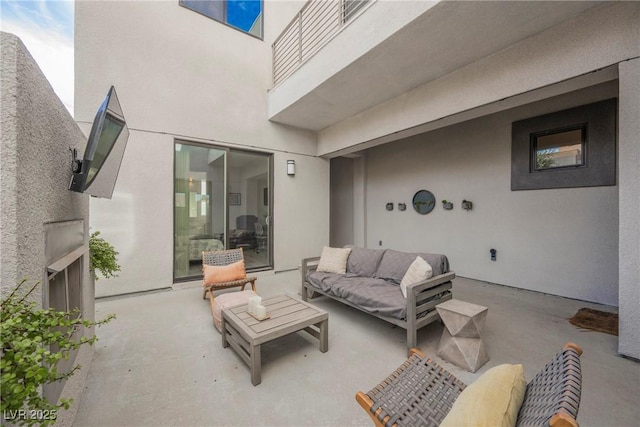 view of patio / terrace featuring a balcony and an outdoor hangout area