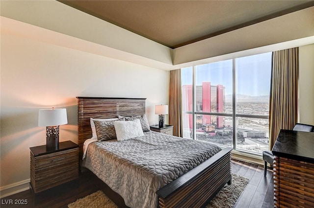 bedroom featuring dark hardwood / wood-style floors