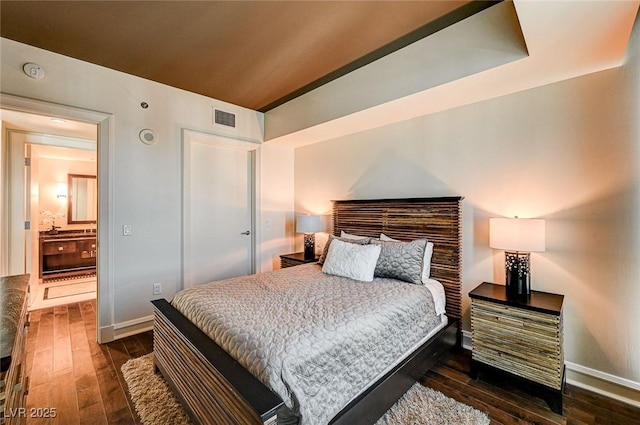 bedroom featuring dark hardwood / wood-style floors