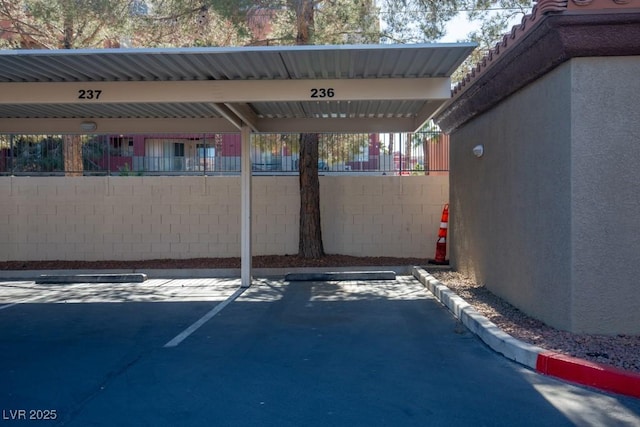 view of parking featuring a carport