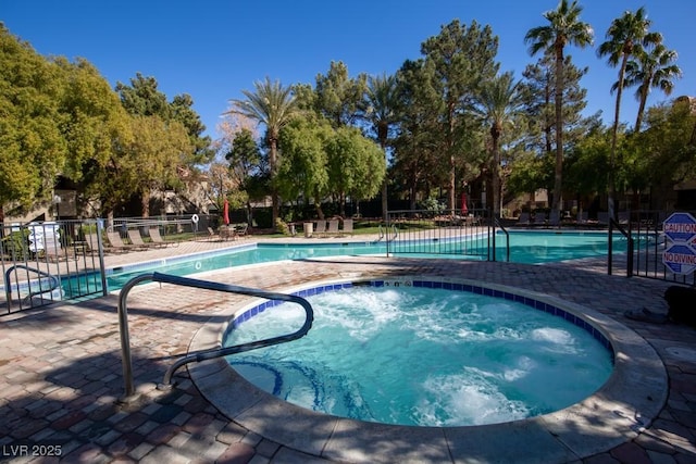 view of pool featuring a community hot tub