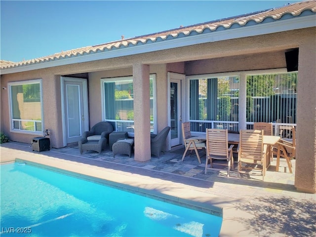 back of house featuring a patio