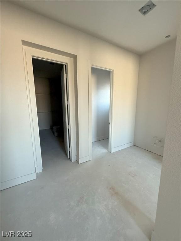 interior space with a walk in closet