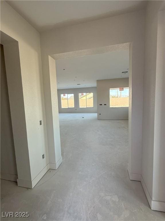 hallway featuring plenty of natural light