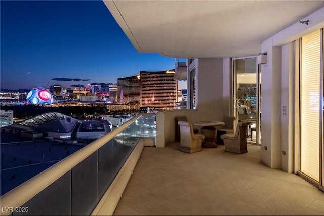 view of balcony at dusk