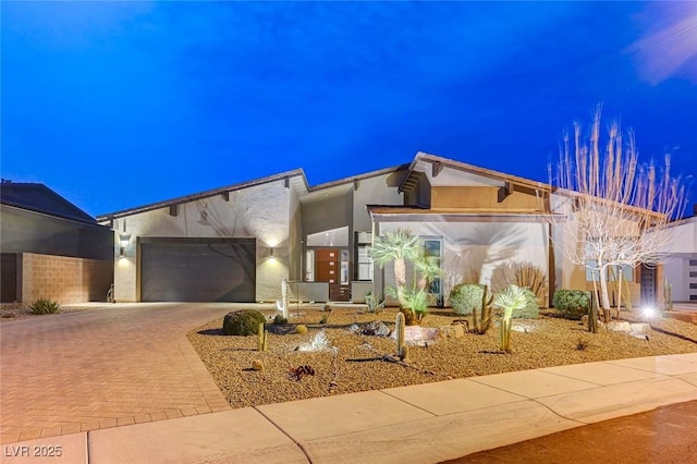 view of front of property featuring a garage