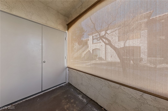 interior space with concrete flooring