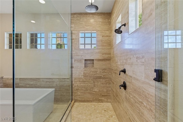 bathroom with a shower with shower door