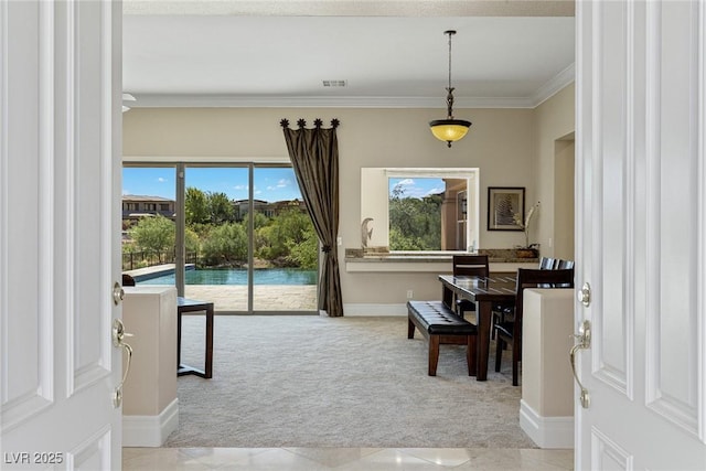 interior space featuring crown molding