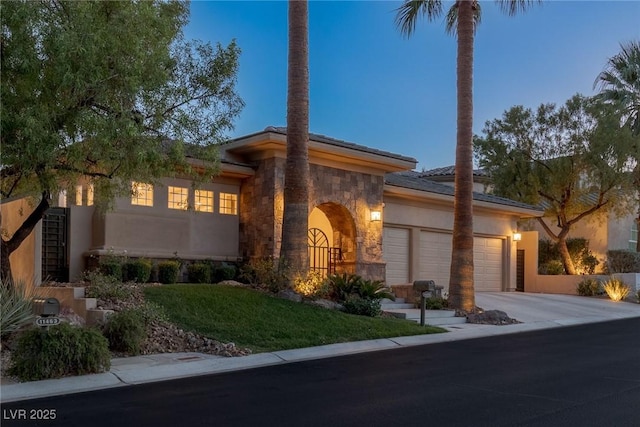 view of front of property with a garage