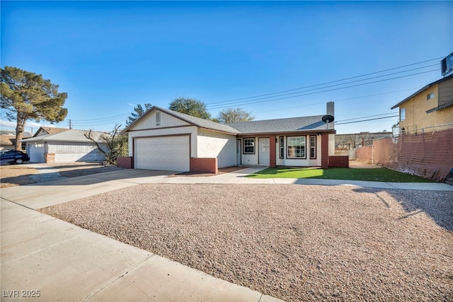 single story home featuring a garage