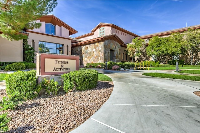 exterior space featuring concrete driveway