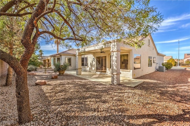 back of house with ceiling fan, central AC, a patio, and stucco siding