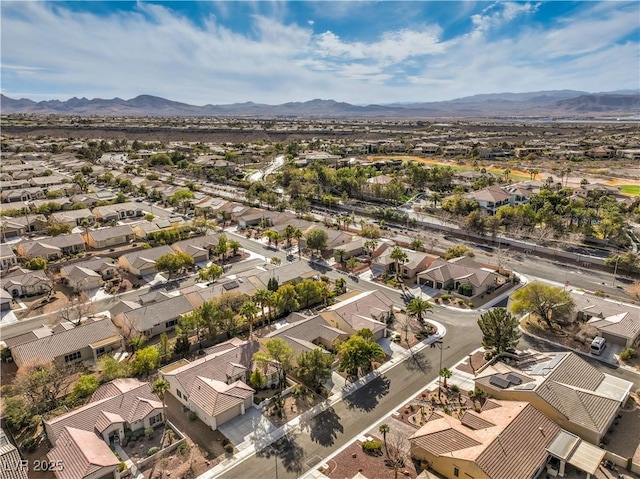 drone / aerial view with a residential view and a mountain view